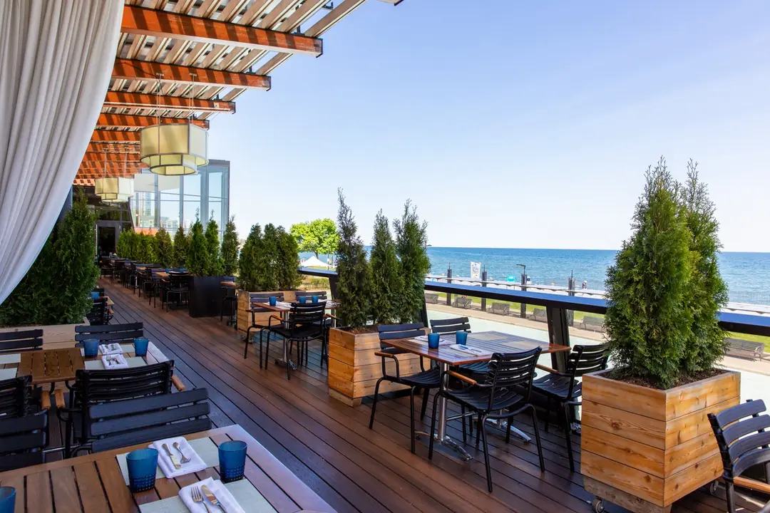 Spencer’s rooftop patio on a sunny day beside the lake